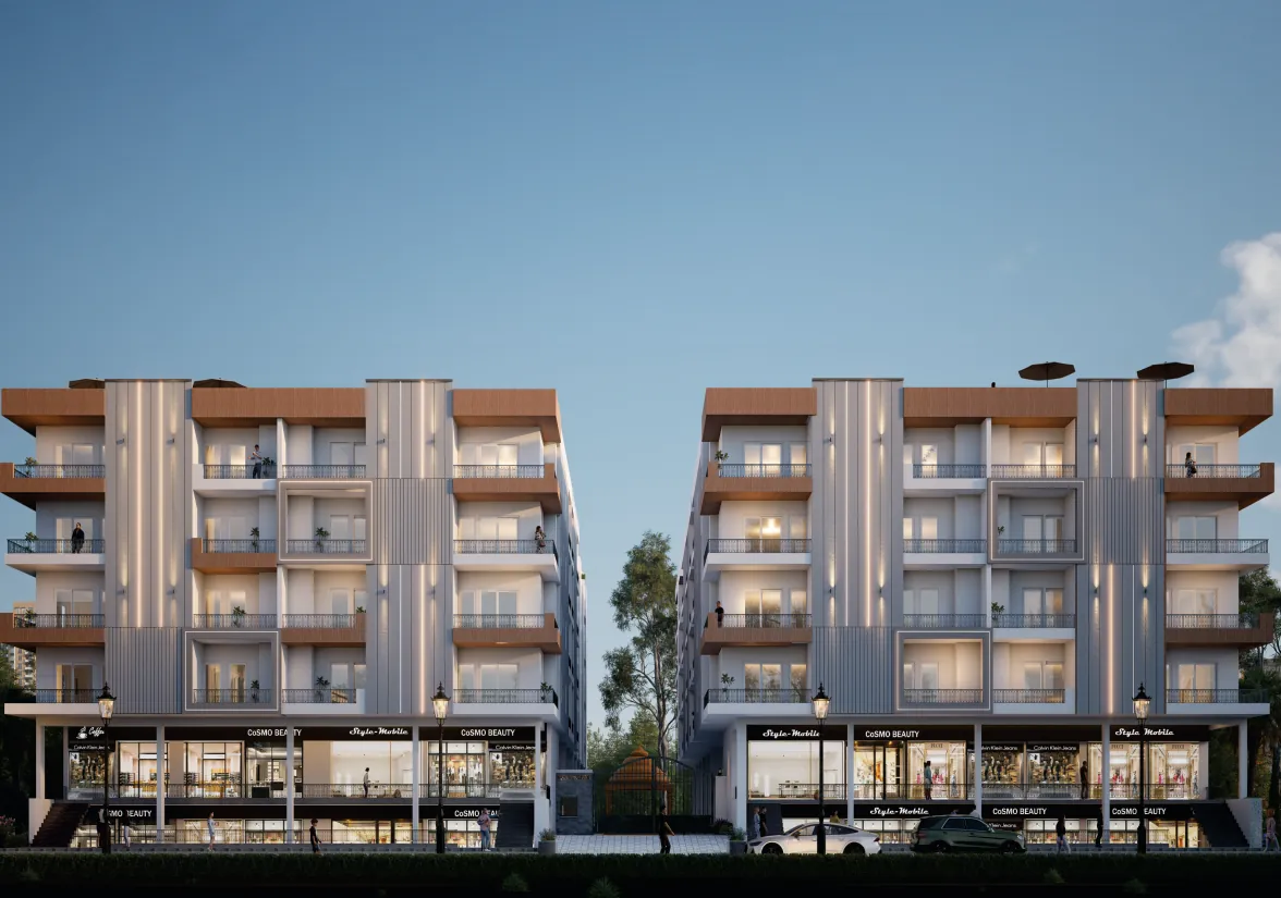 Front elevation of the twin blocks with high-street shops at ground level